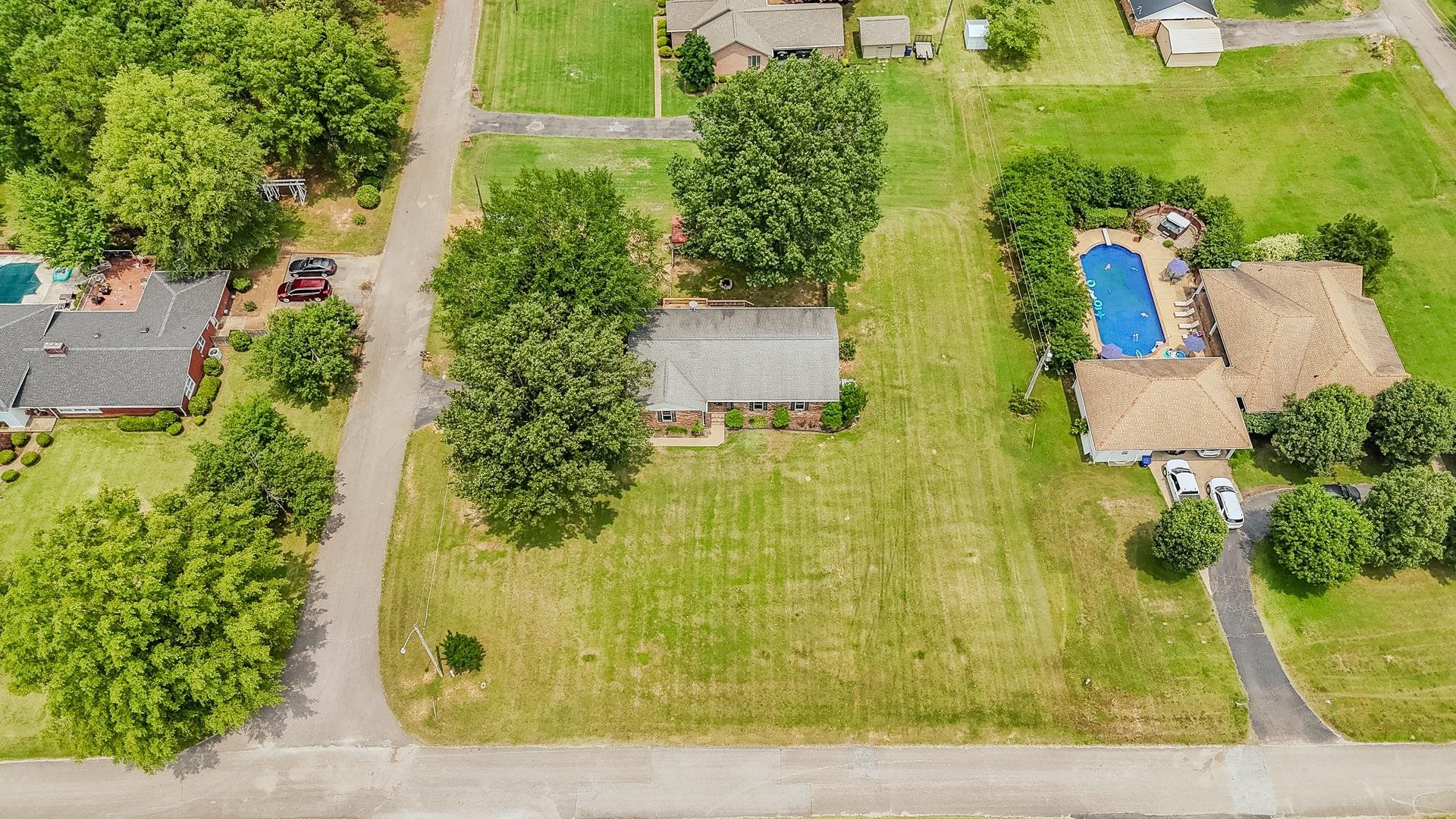 606 Duren Drive Adamsville, TN 38310 - Photo 4 of 40 an aerial view of residential house with outdoor space