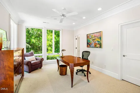 a view of a house with sitting area and furniture