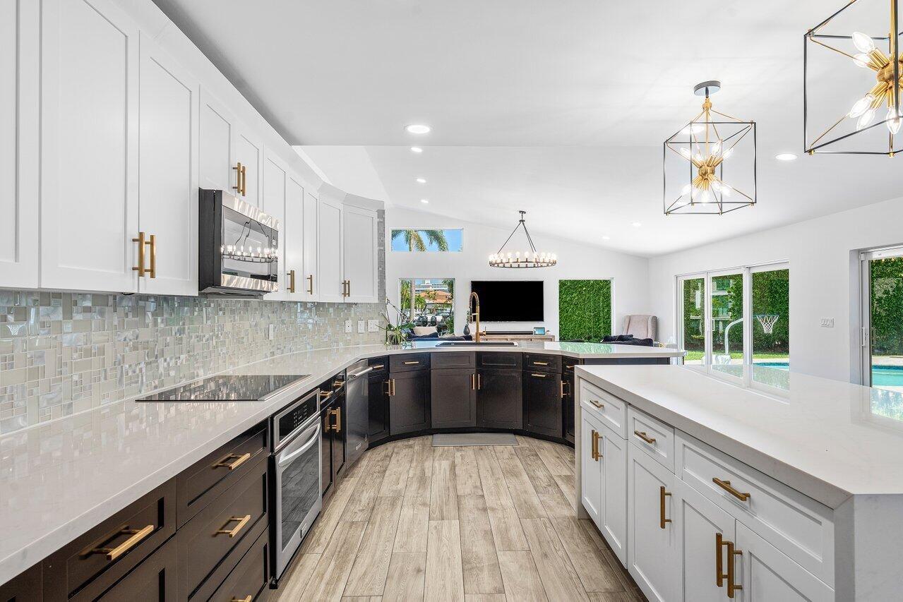 7700 Northeast Spanish Trail Court Boca Raton, FL 33487 - Photo 9 of 30 4