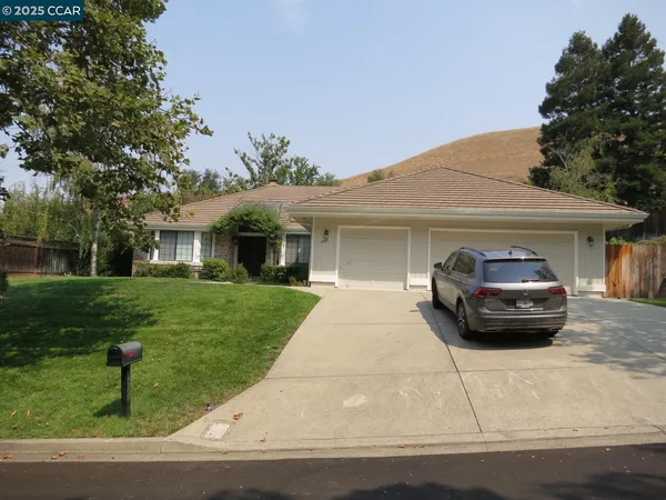 a car parked in front of a house