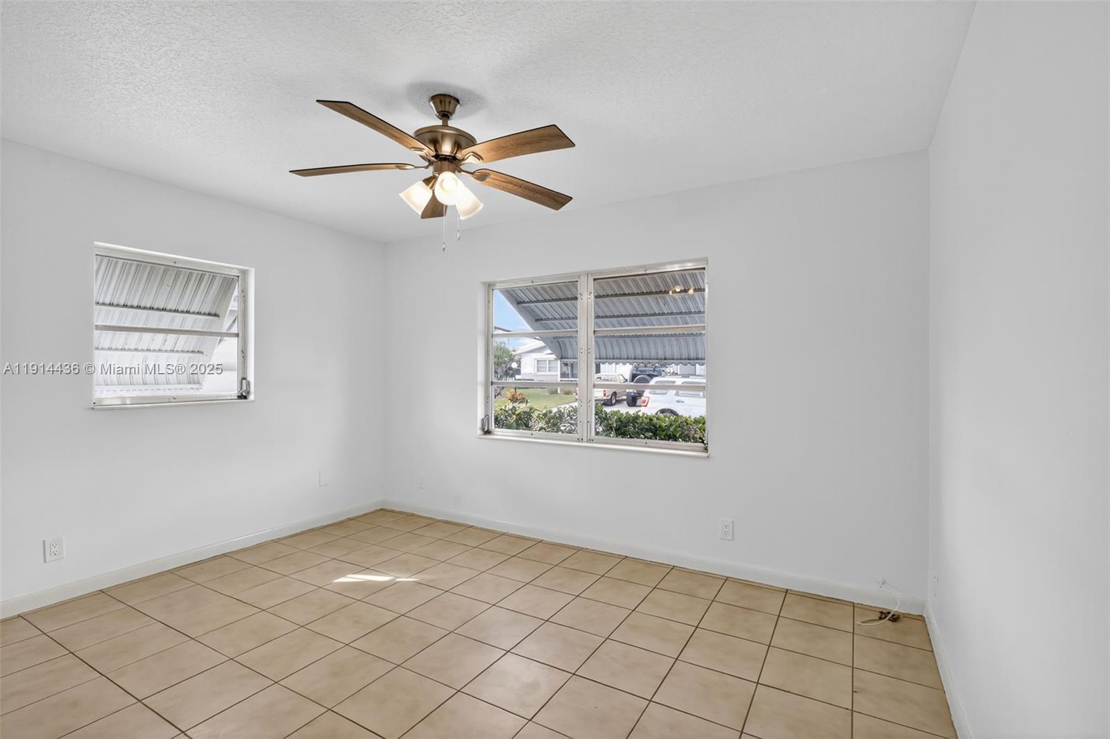 5331 Belleville Road West Palm Beach, FL 33417 - Photo 23 of 49 a view of an empty room and window