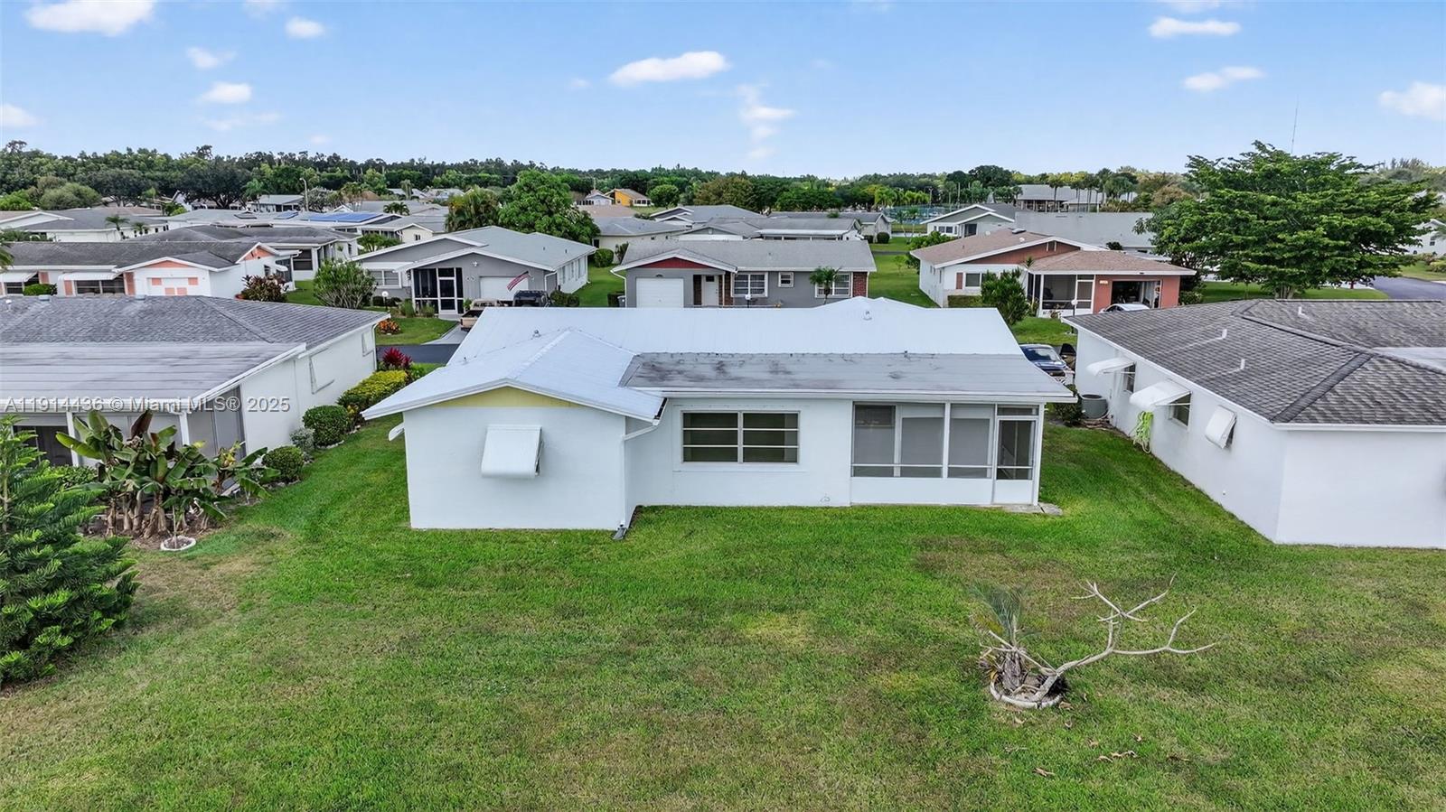 5331 Belleville Road West Palm Beach, FL 33417 - Photo 45 of 49 an aerial view of residential houses with outdoor space and trees