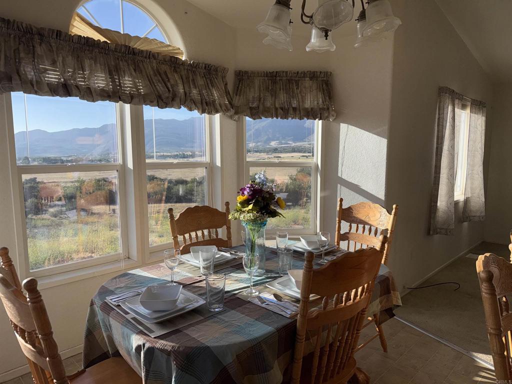 37697 Montezuma Valley Road Ranchita, CA 92066 - Photo 12 of 47 a view of a dining room with furniture window and outside view