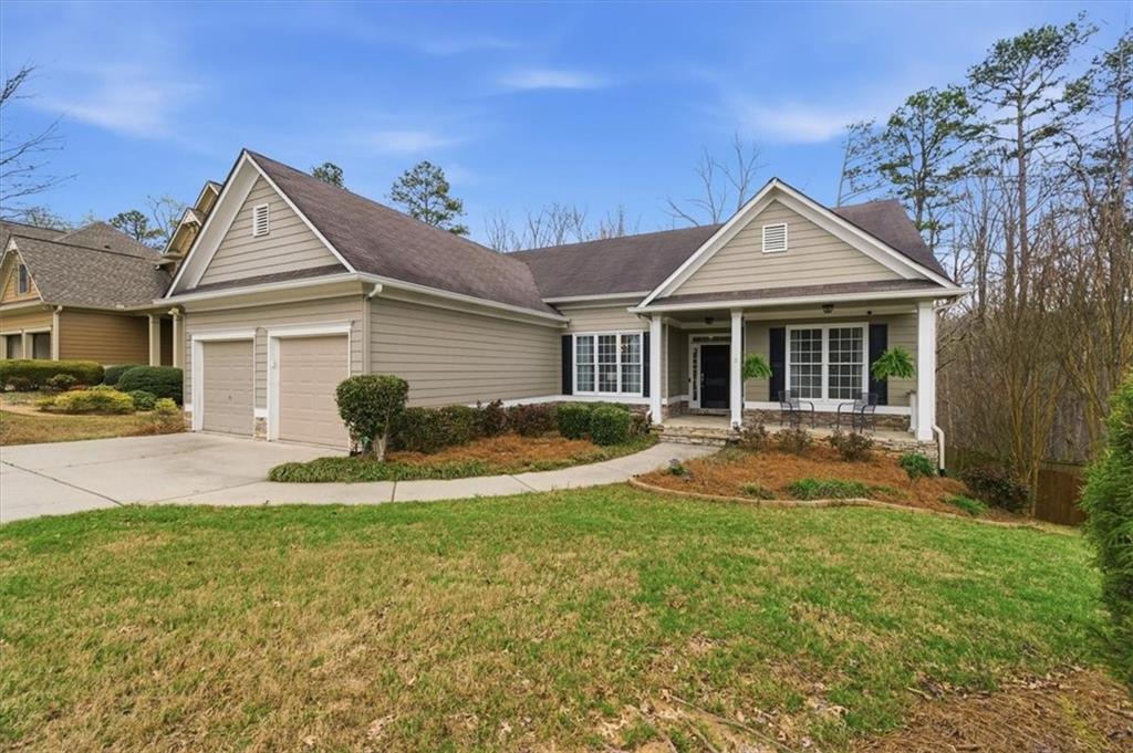 526 Oriole Farm Trail Canton, GA 30114 - Photo 1 of 1 a front view of a house with a yard and porch