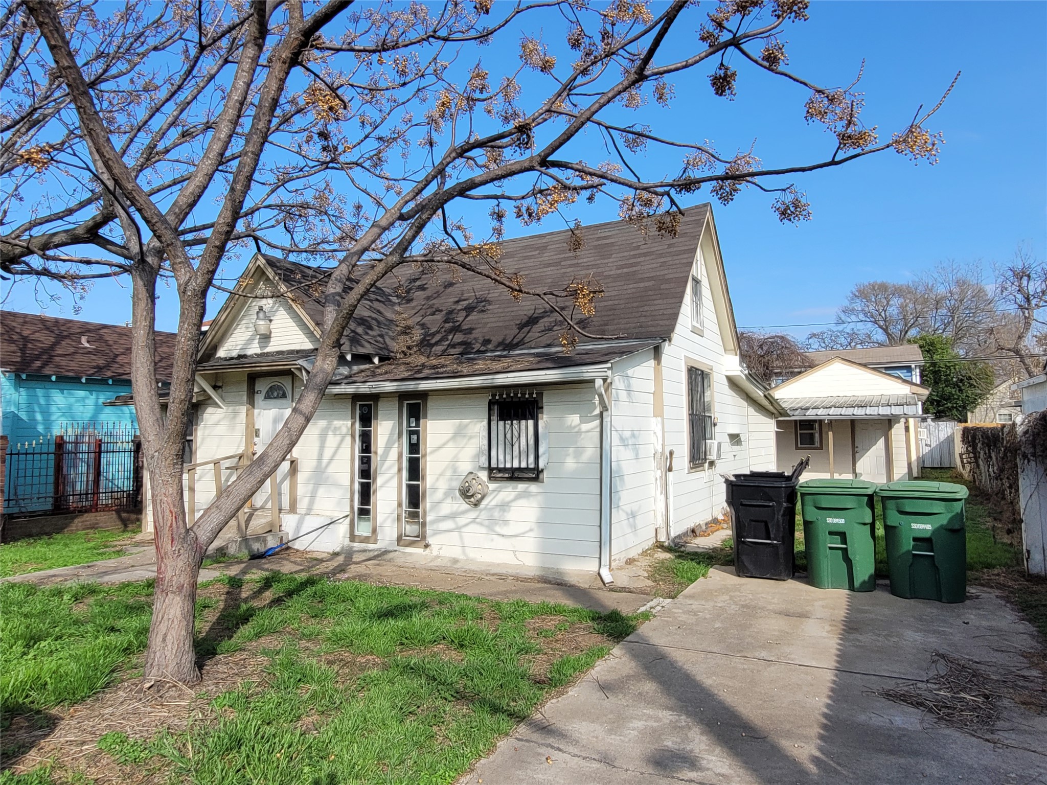 4512 Siegel Street Houston, TX 77009 - Photo 2 of 18 a view of a house with a yard patio and a garden