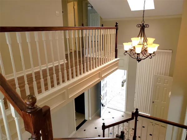 a view of a porch with wooden floor