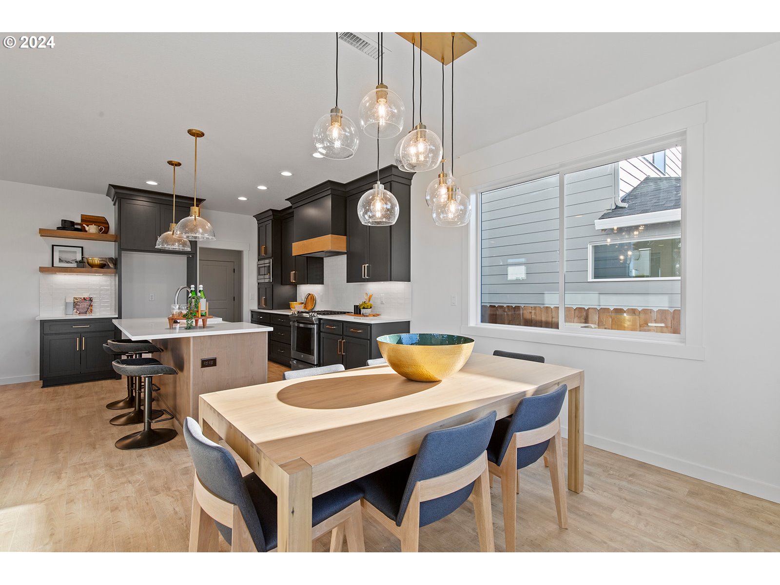 930 Northwest 178th Street Ridgefield, WA 98642 - Photo 24 of 47 a kitchen with a table and chairs in it