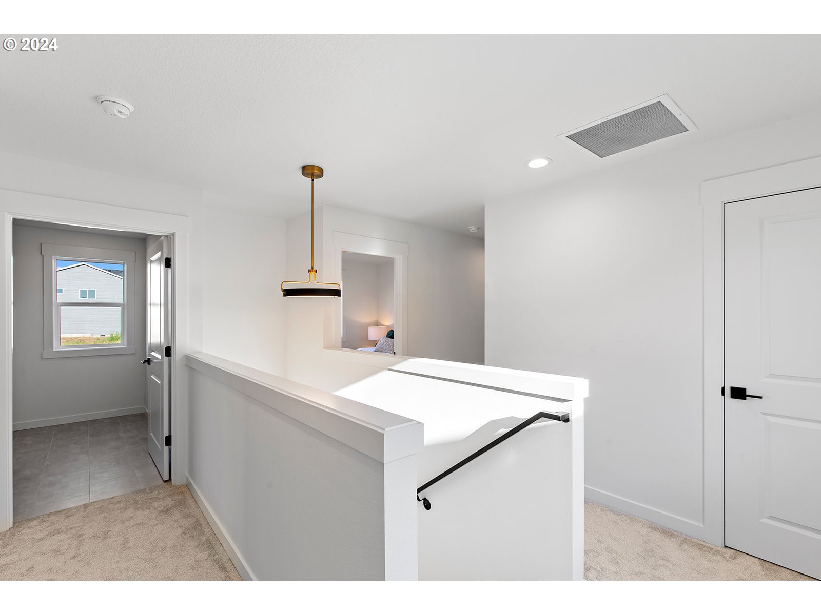 930 Northwest 178th Street Ridgefield, WA 98642 - Photo 37 of 47 a kitchen with a sink cabinets and wooden floor