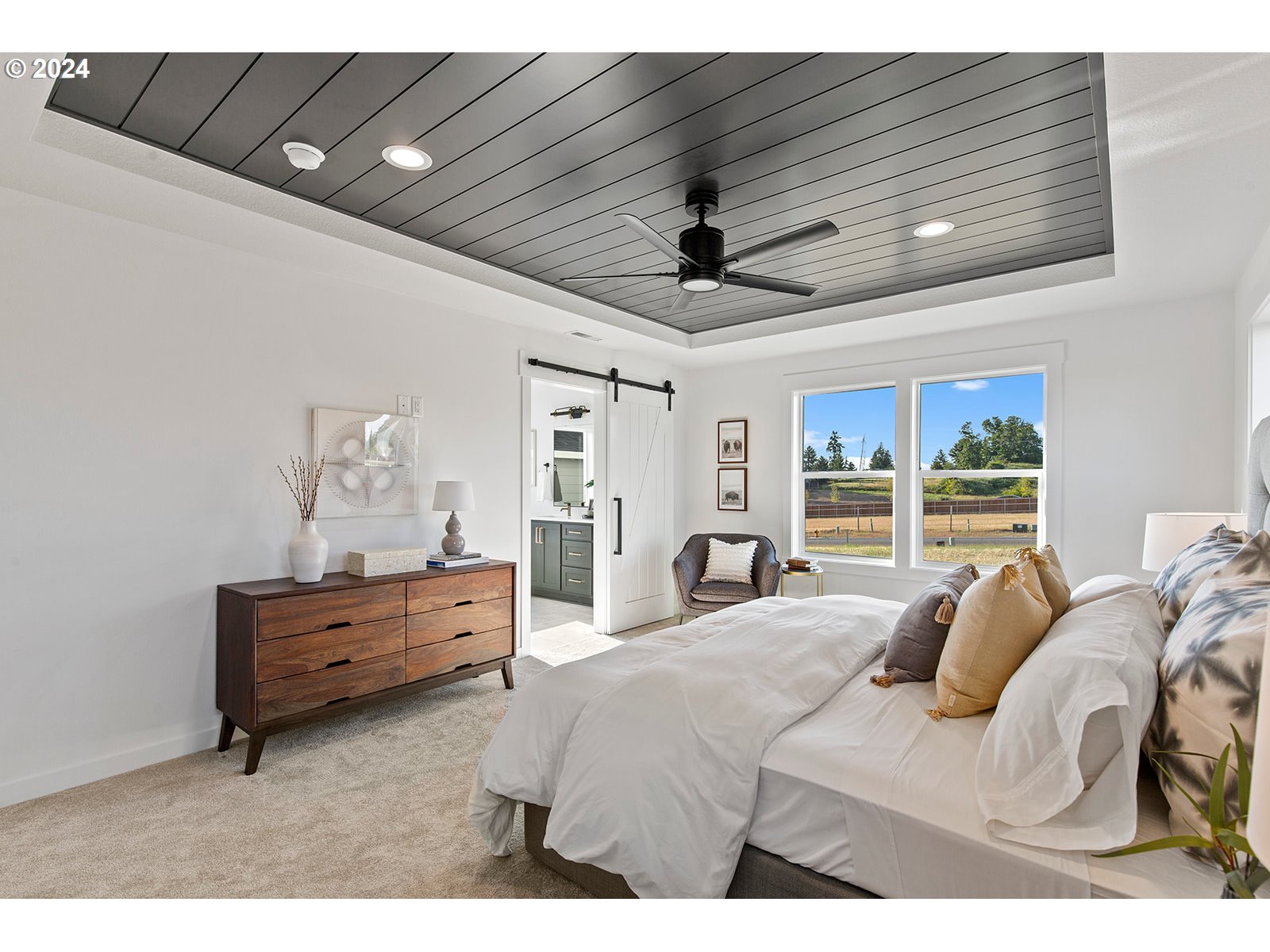 930 Northwest 178th Street Ridgefield, WA 98642 - Photo 40 of 47 a bed room with a bed and a window