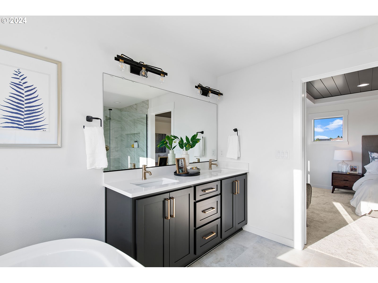 930 Northwest 178th Street Ridgefield, WA 98642 - Photo 45 of 47 a bathroom with a sink a toilet and mirror