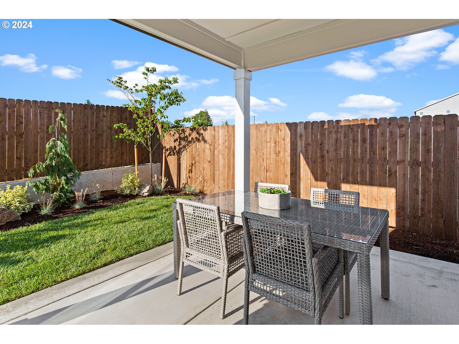 930 Northwest 178th Street Ridgefield, WA 98642 - Photo 46 of 47 a view of an chairs and table in the patio