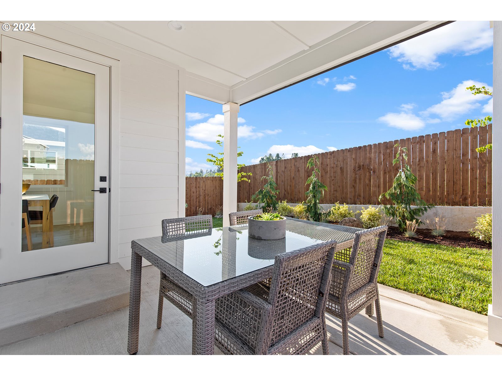 930 Northwest 178th Street Ridgefield, WA 98642 - Photo 47 of 47 a outdoor dining space with furniture and garden view