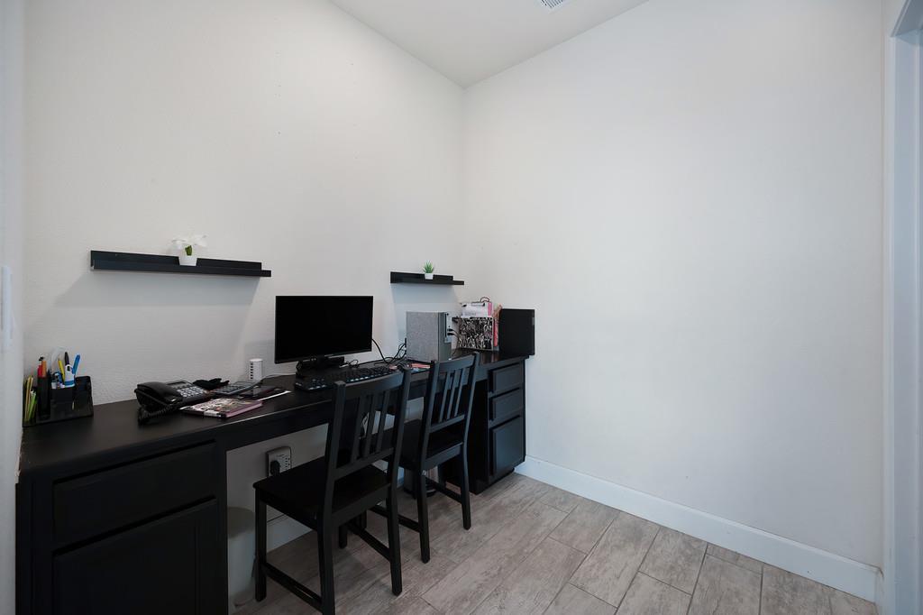 1004 Lavender Street Manteca, CA 95337 - Photo 12 of 35 a view of a workspace with furniture