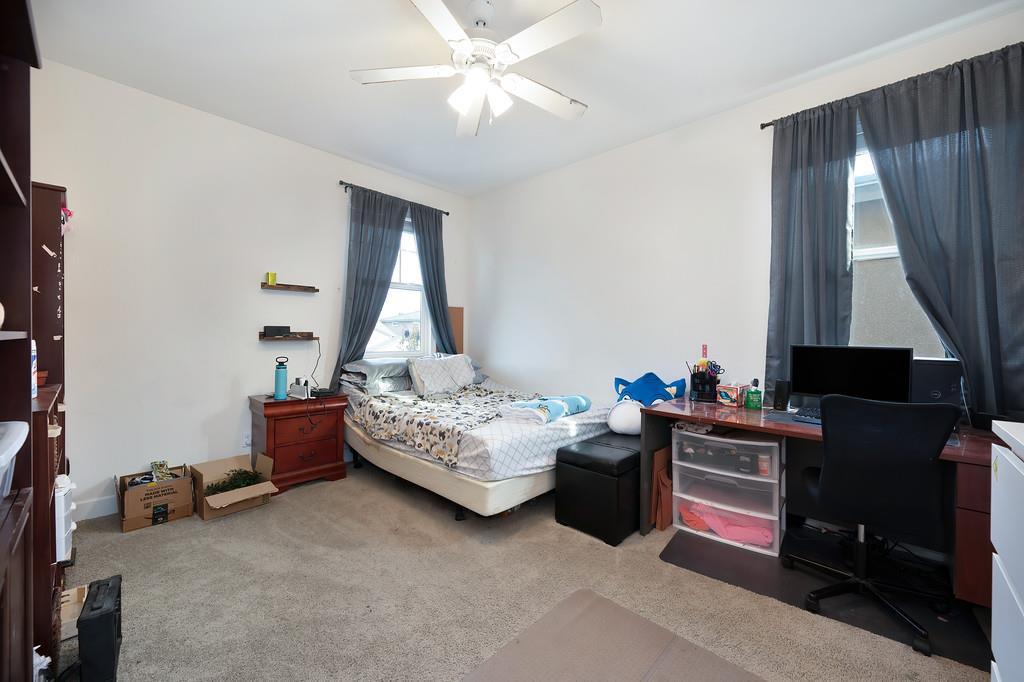1004 Lavender Street Manteca, CA 95337 - Photo 16 of 35 a bedroom with bed and window