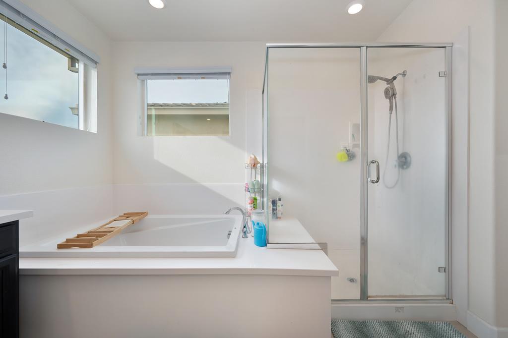 1004 Lavender Street Manteca, CA 95337 - Photo 28 of 35 a bathroom with a shower and a sink