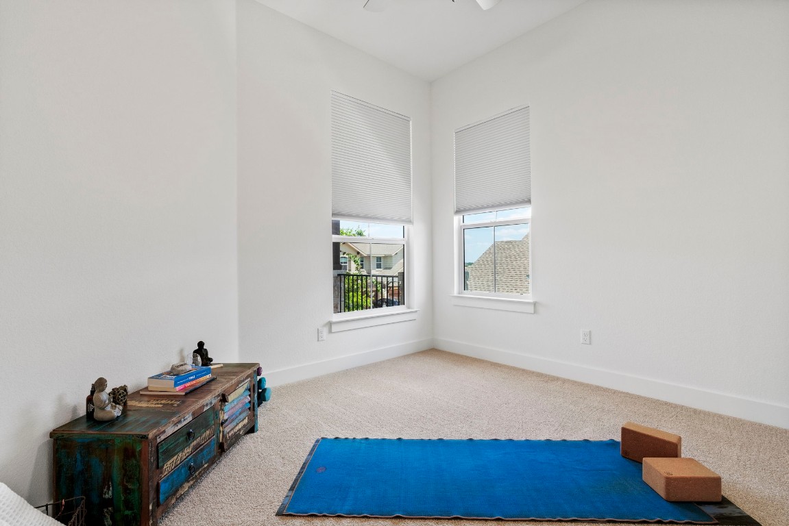 307 Cartwheel Bend Austin, TX 78738 - Photo 15 of 38 a living room with furniture and a window