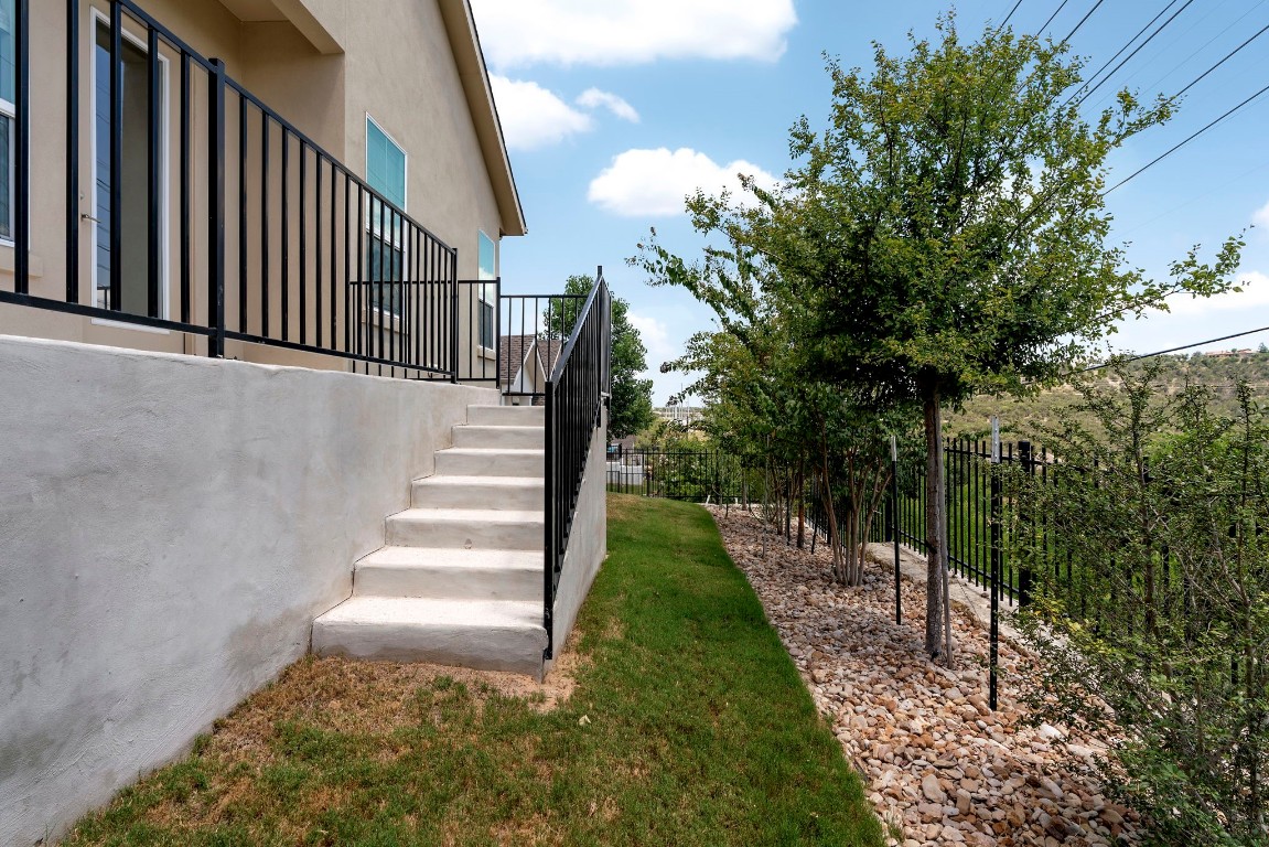 307 Cartwheel Bend Austin, TX 78738 - Photo 27 of 38 a view of entryway with garden