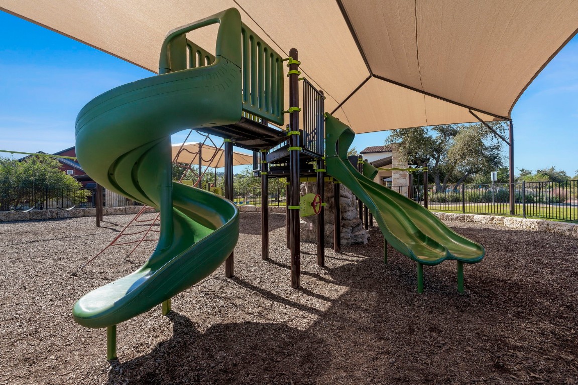 307 Cartwheel Bend Austin, TX 78738 - Photo 32 of 38 a view of a park with slide