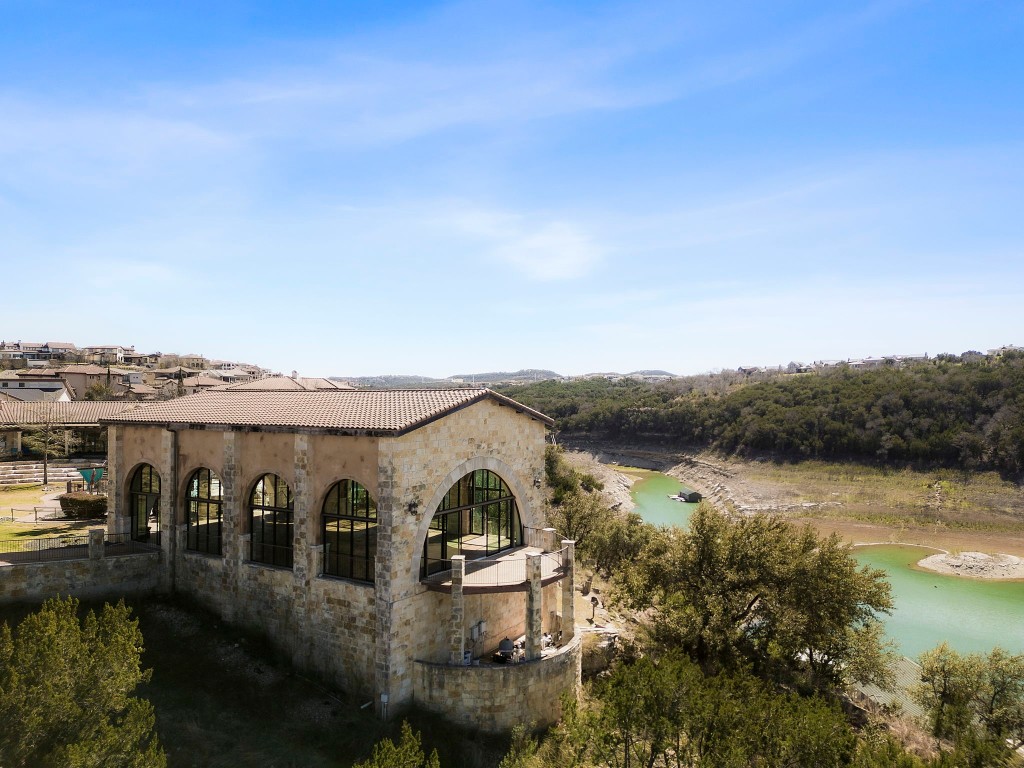 307 Cartwheel Bend Austin, TX 78738 - Photo 34 of 38 a view of a lake with a mountain in the back