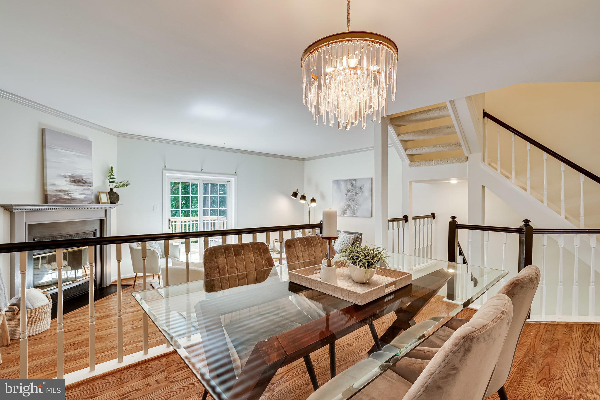 11962 Sentinel Point Court Reston, VA 20191 - Photo 15 of 62 The dining room opens to the living room.