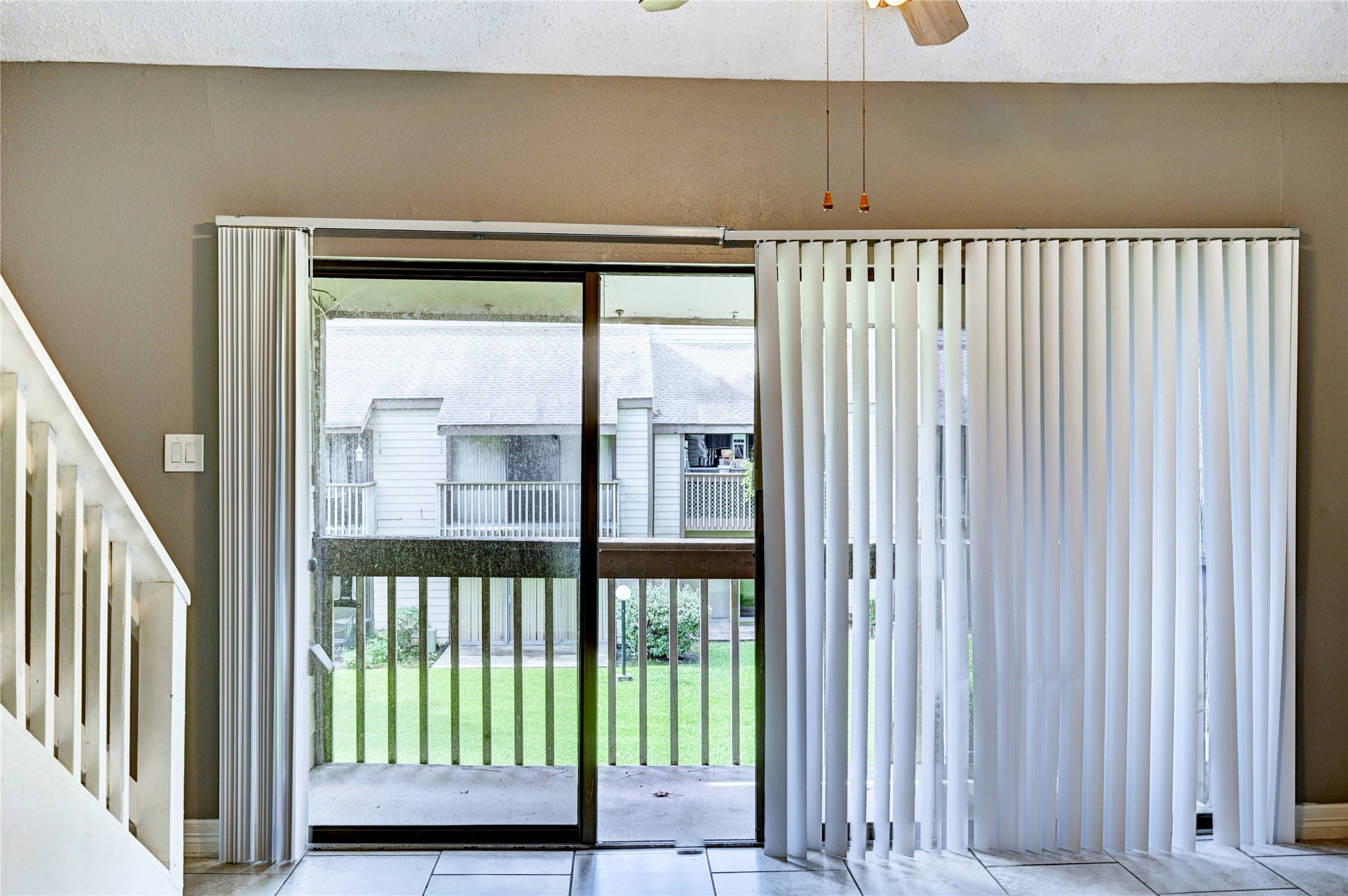 12900 Walden Road, Unit 6 Montgomery, TX 77356 - Photo 18 of 39 Another view of the patio area from the living room.