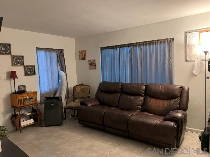 1909 South Freeman Street Oceanside, CA 92054 - Photo 4 of 14 a living room with furniture and a wooden floor