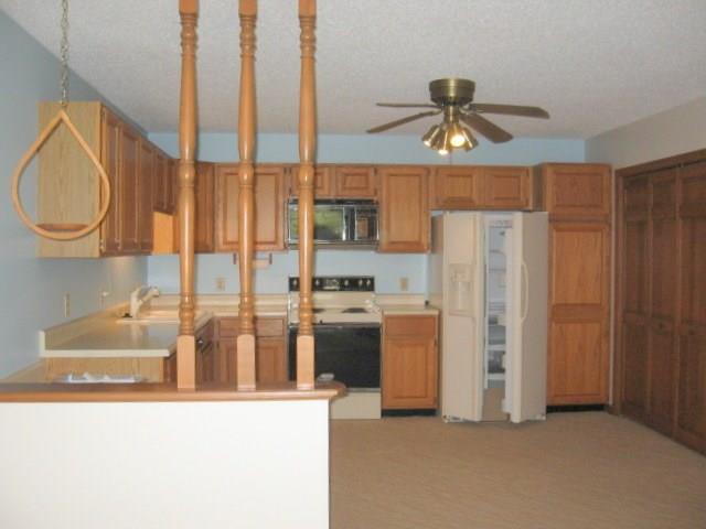 320 Augusta Road, Unit 2 Winslow, ME 04901 - Photo 3 of 20 Looking back to the kitchen from the...