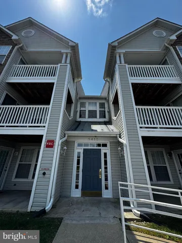 a view of a house with a roof deck