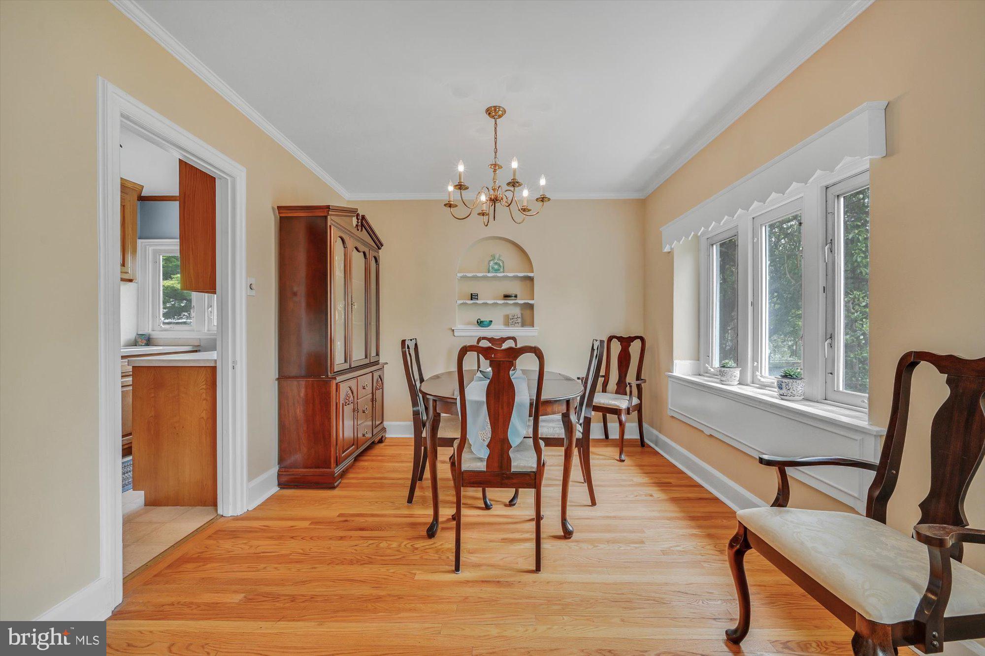 207 Harrogate Road Wynnewood, PA 19096 - Photo 10 of 33 a view of a dining room with furniture window and wooden floor