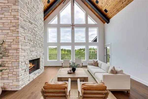 a living room with furniture and a table