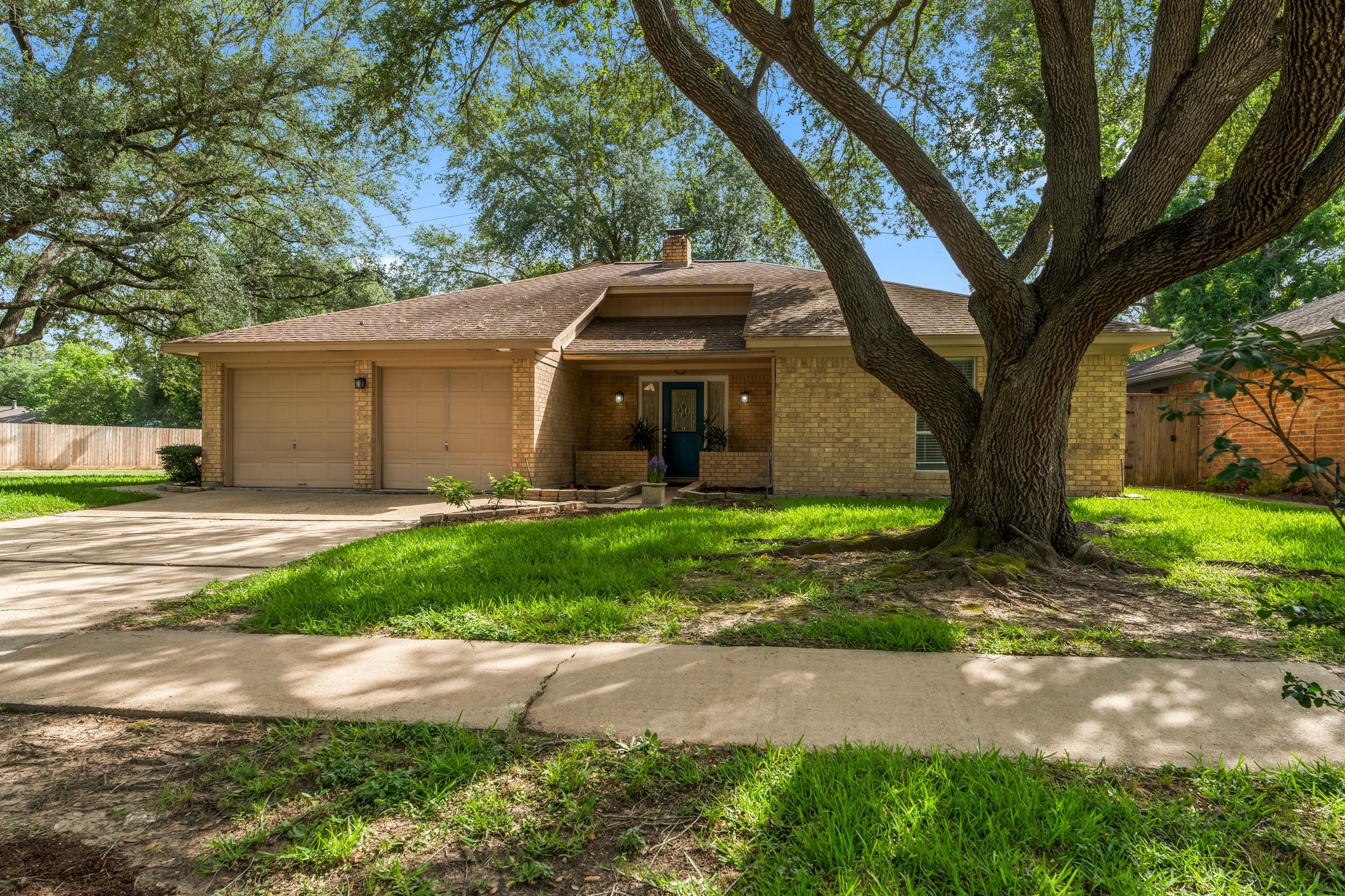 6103 Sunnygate Drive Spring, TX 77373 - Photo 2 of 25 a view of a house with a yard