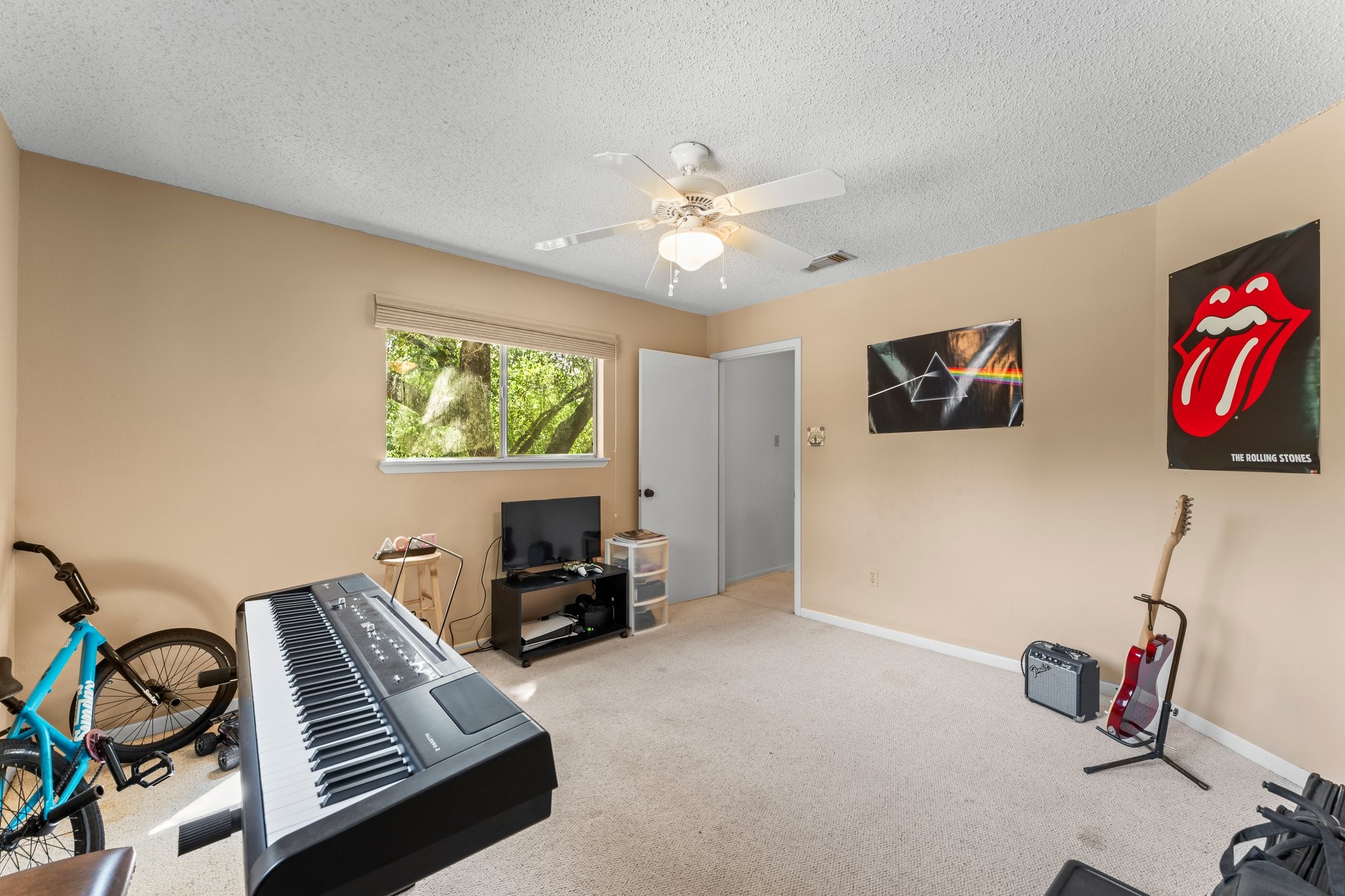 6103 Sunnygate Drive Spring, TX 77373 - Photo 22 of 25 a view of livingroom with workspace and a window