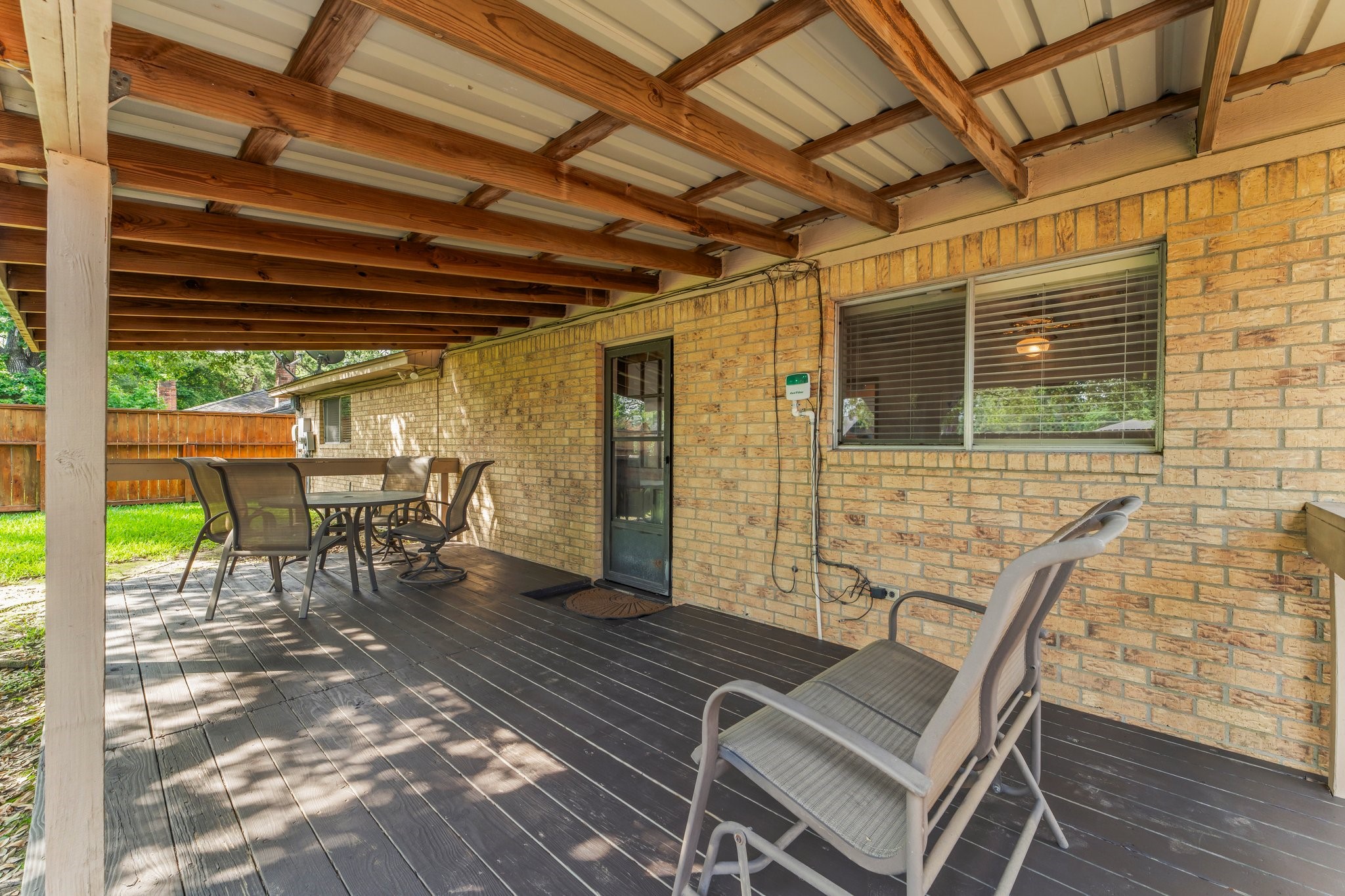 6103 Sunnygate Drive Spring, TX 77373 - Photo 23 of 25 a view of an outdoor space with seating area