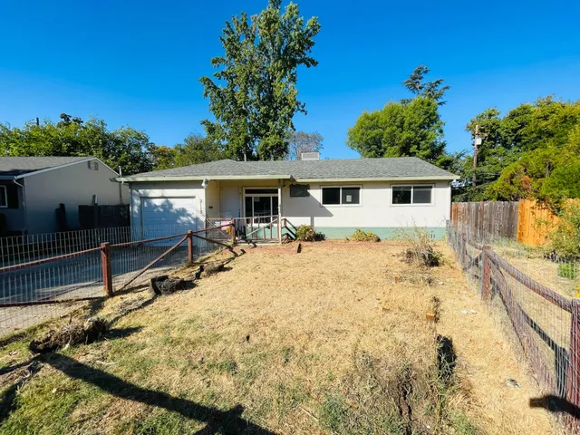 a view of a house with a patio