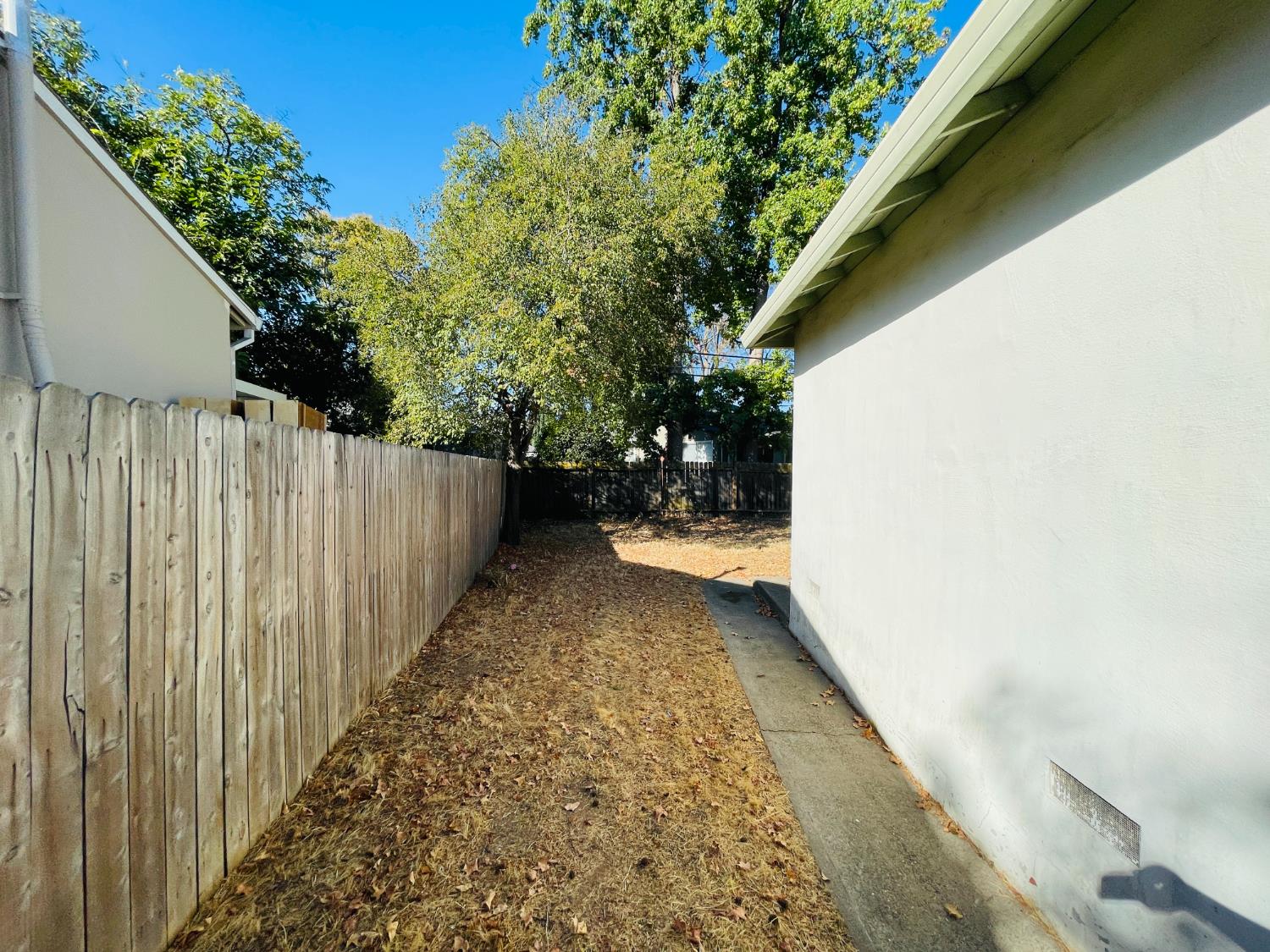 2115 Ruby Court Sacramento, CA 95821 - Photo 7 of 17 a view of a yard with wooden fence