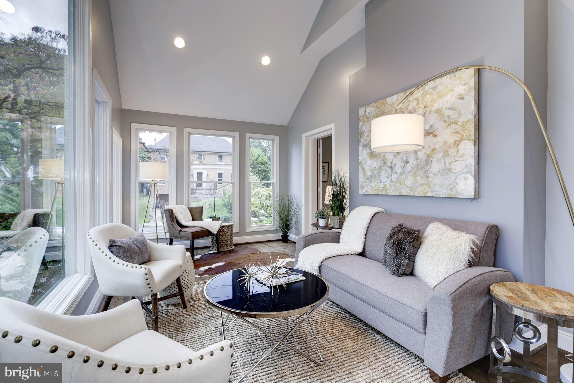 4814 Sedgwick Street Northwest Washington, DC 20016 - Photo 12 of 30 a living room with furniture and a large window