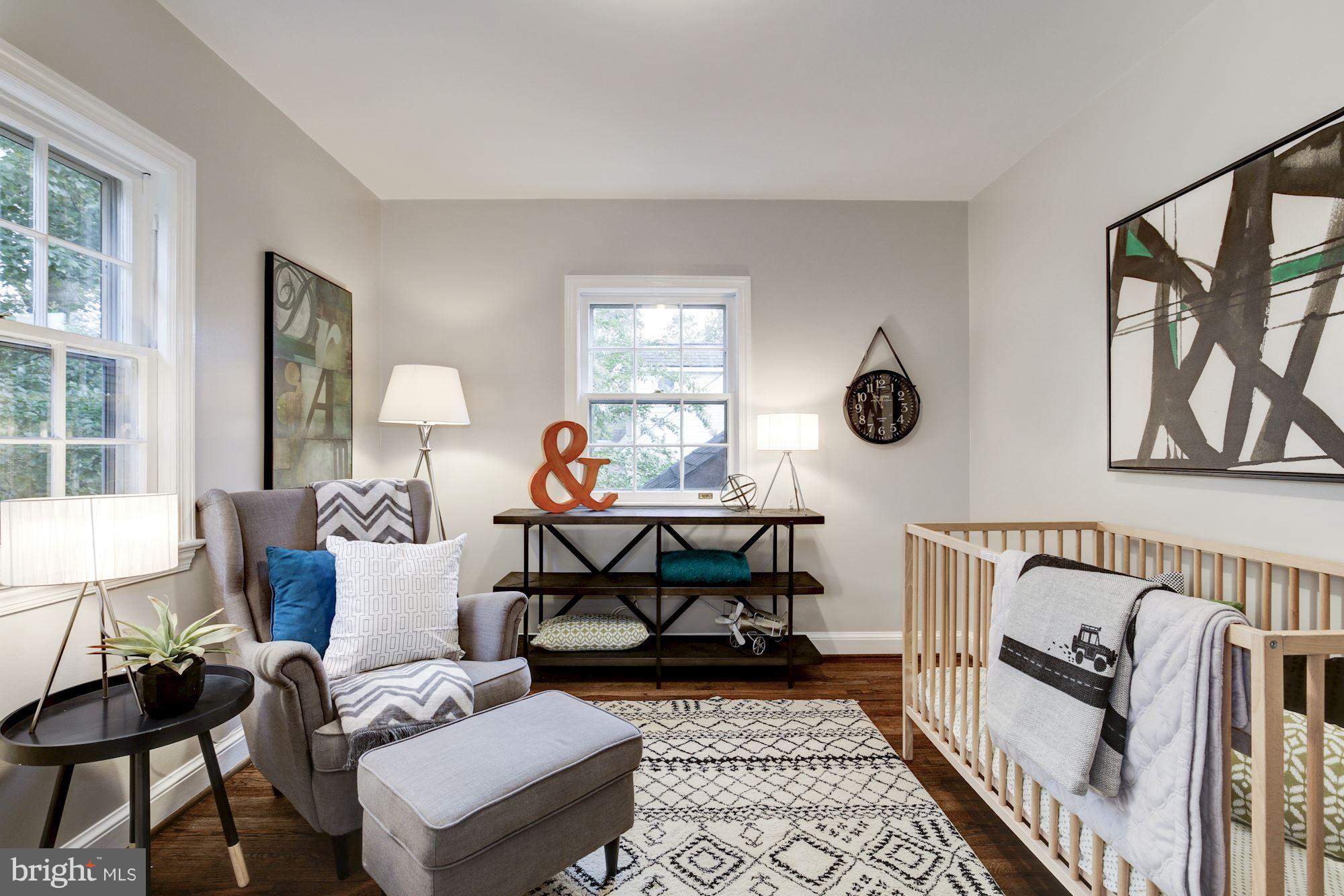 4814 Sedgwick Street Northwest Washington, DC 20016 - Photo 15 of 30 a living room with furniture and a window