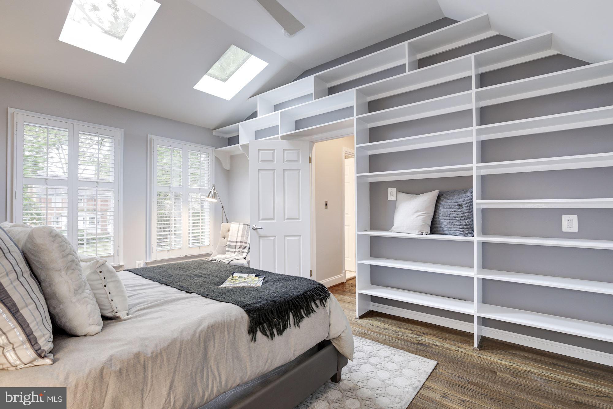 4814 Sedgwick Street Northwest Washington, DC 20016 - Photo 18 of 30 a bedroom with a bed and a large window