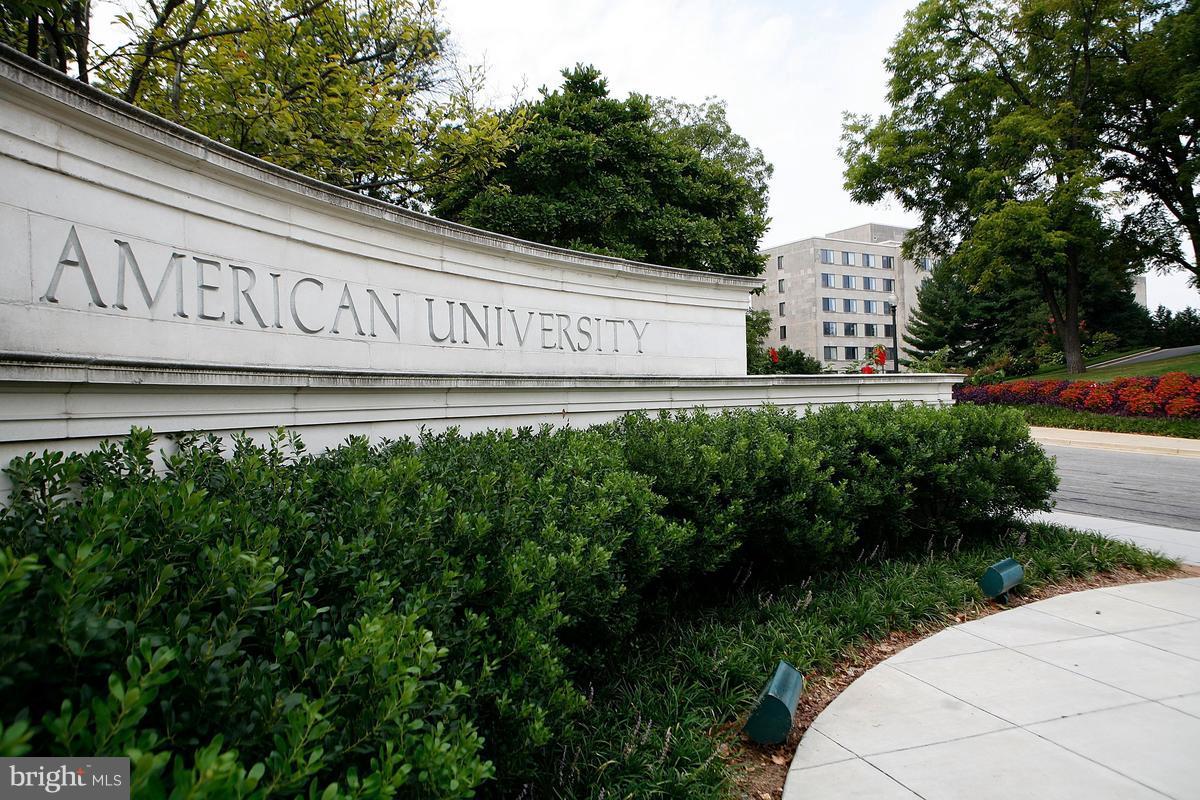 4814 Sedgwick Street Northwest Washington, DC 20016 - Photo 30 of 30 a sign on the side of a building