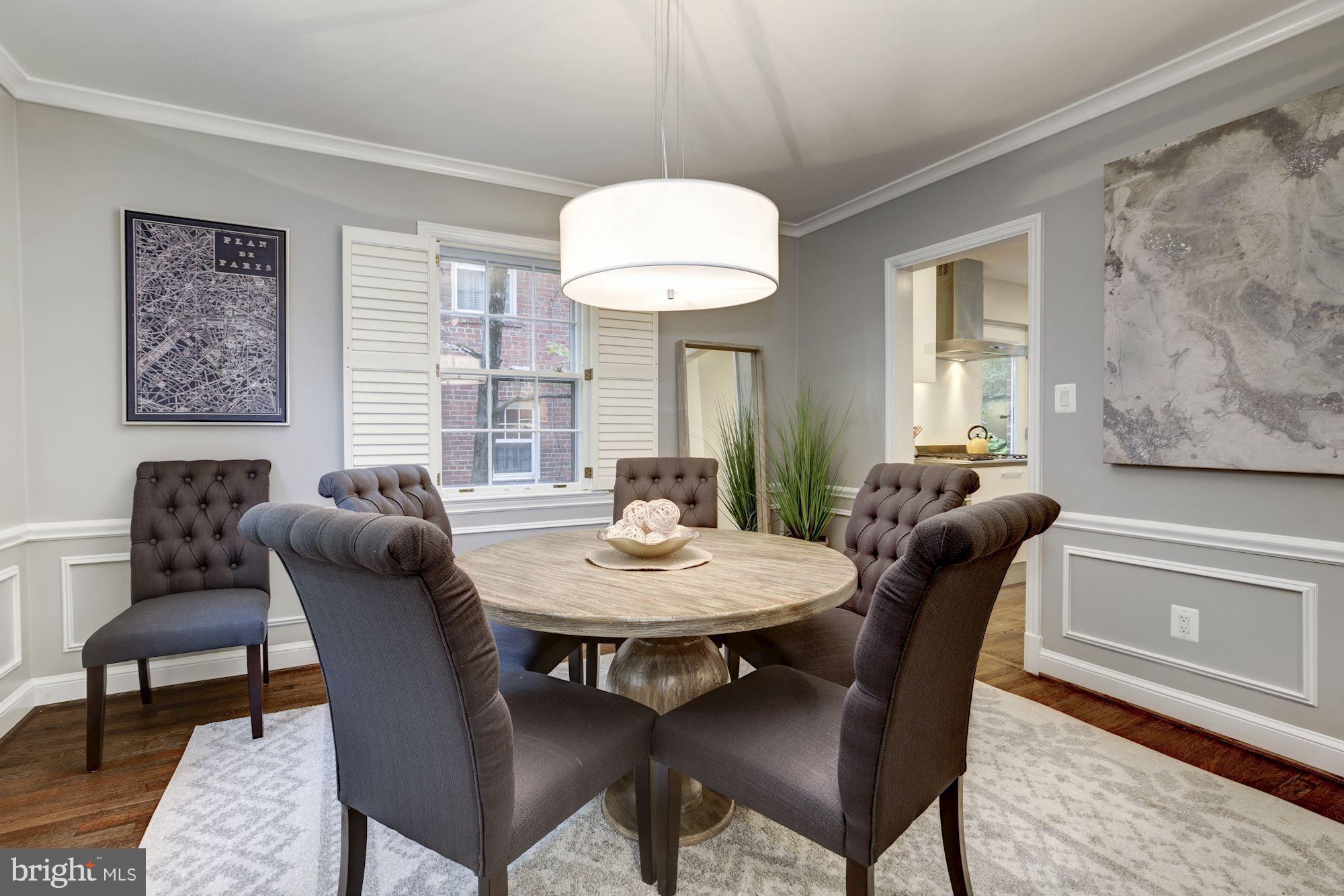 4814 Sedgwick Street Northwest Washington, DC 20016 - Photo 6 of 30 a view of a dining room with furniture and wooden floor