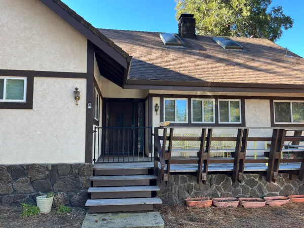 a front view of a house with porch