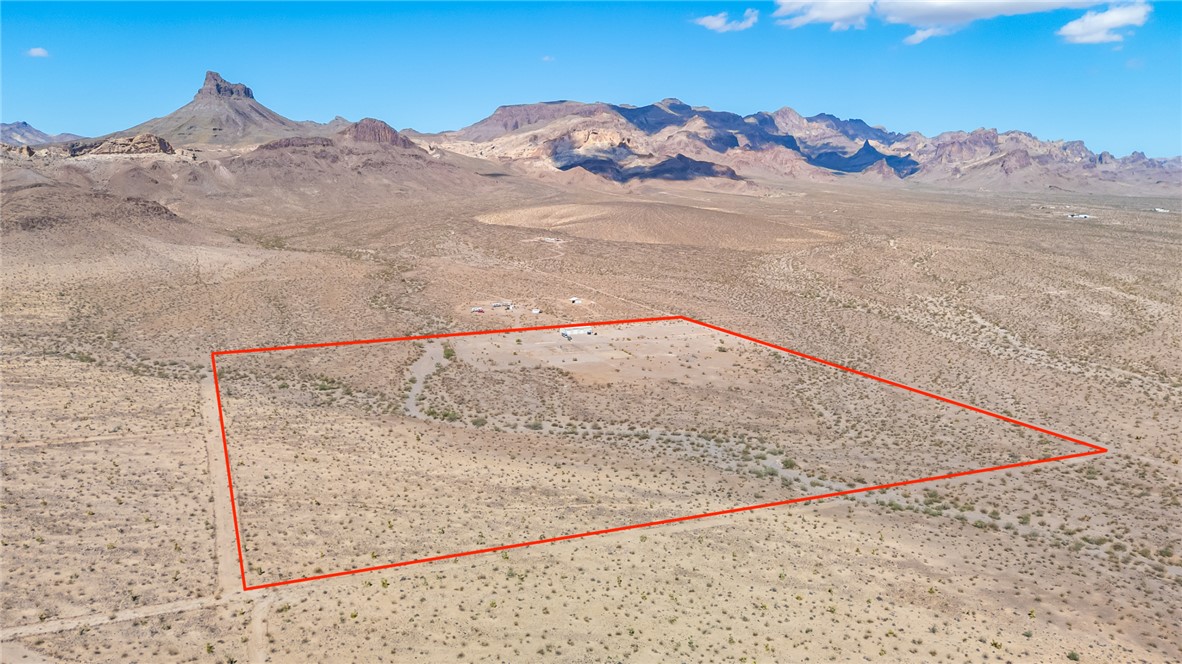6982 Ocotillo Road Golden Valley, AZ 86413 - Photo 25 of 28 View of rural area featuring a mountainous background and property boundaries highlighted
