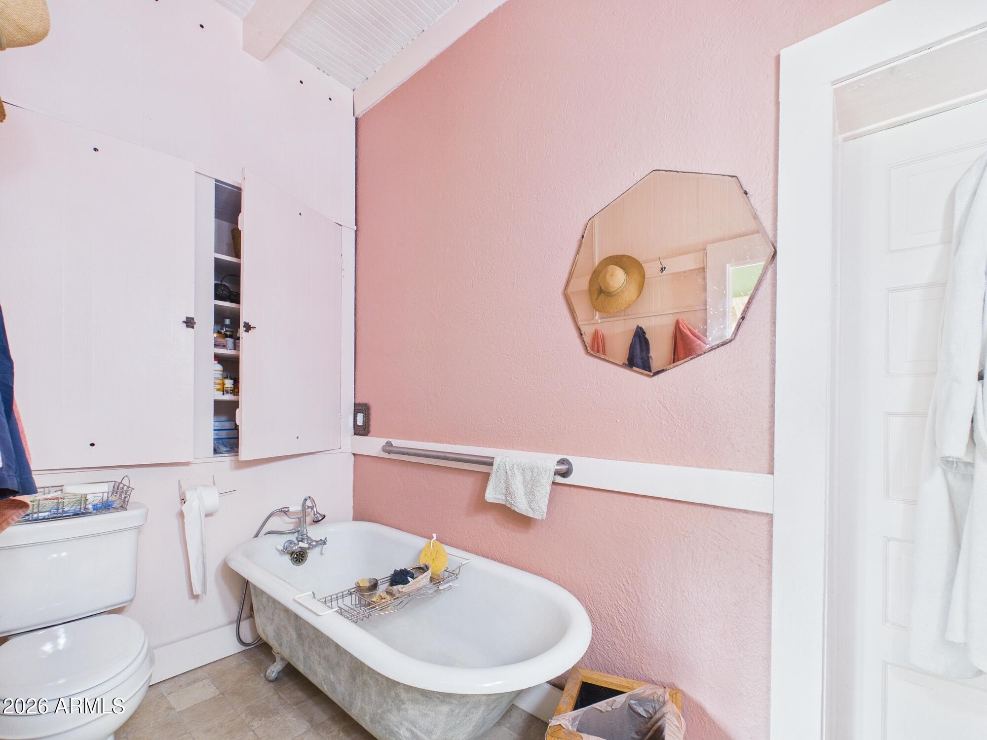 198 4th Street Clifton, AZ 85533 - Photo 13 of 30 a bathroom with a sink toilet and mirror