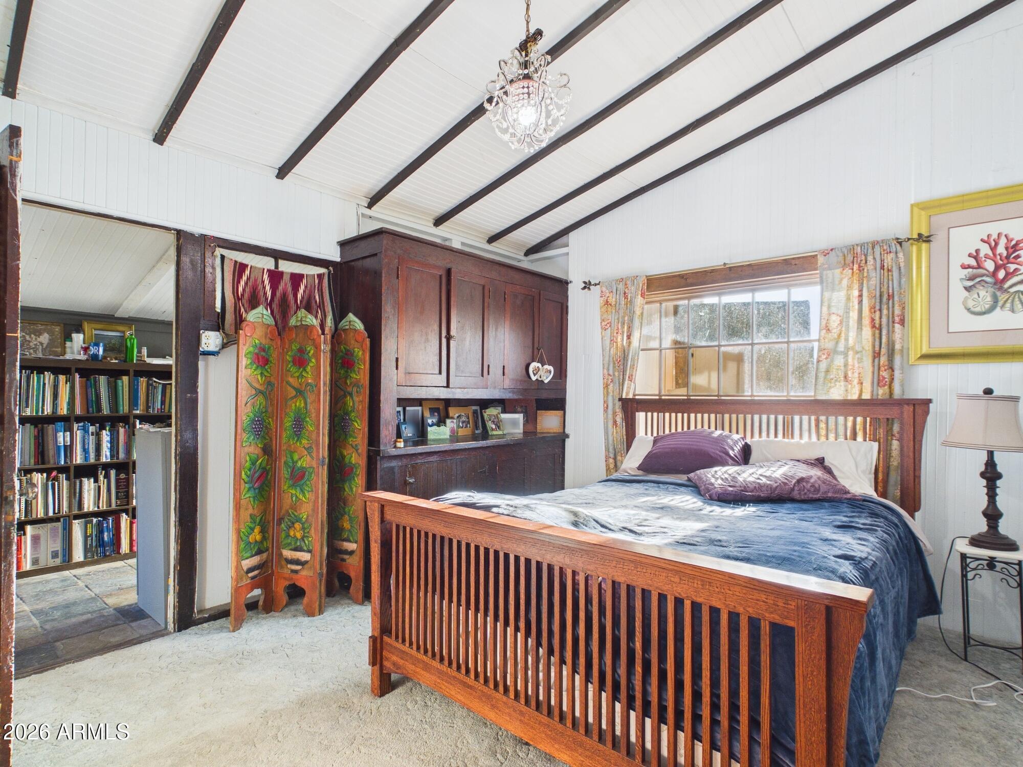 198 4th Street Clifton, AZ 85533 - Photo 15 of 30 a bedroom with bed and a window