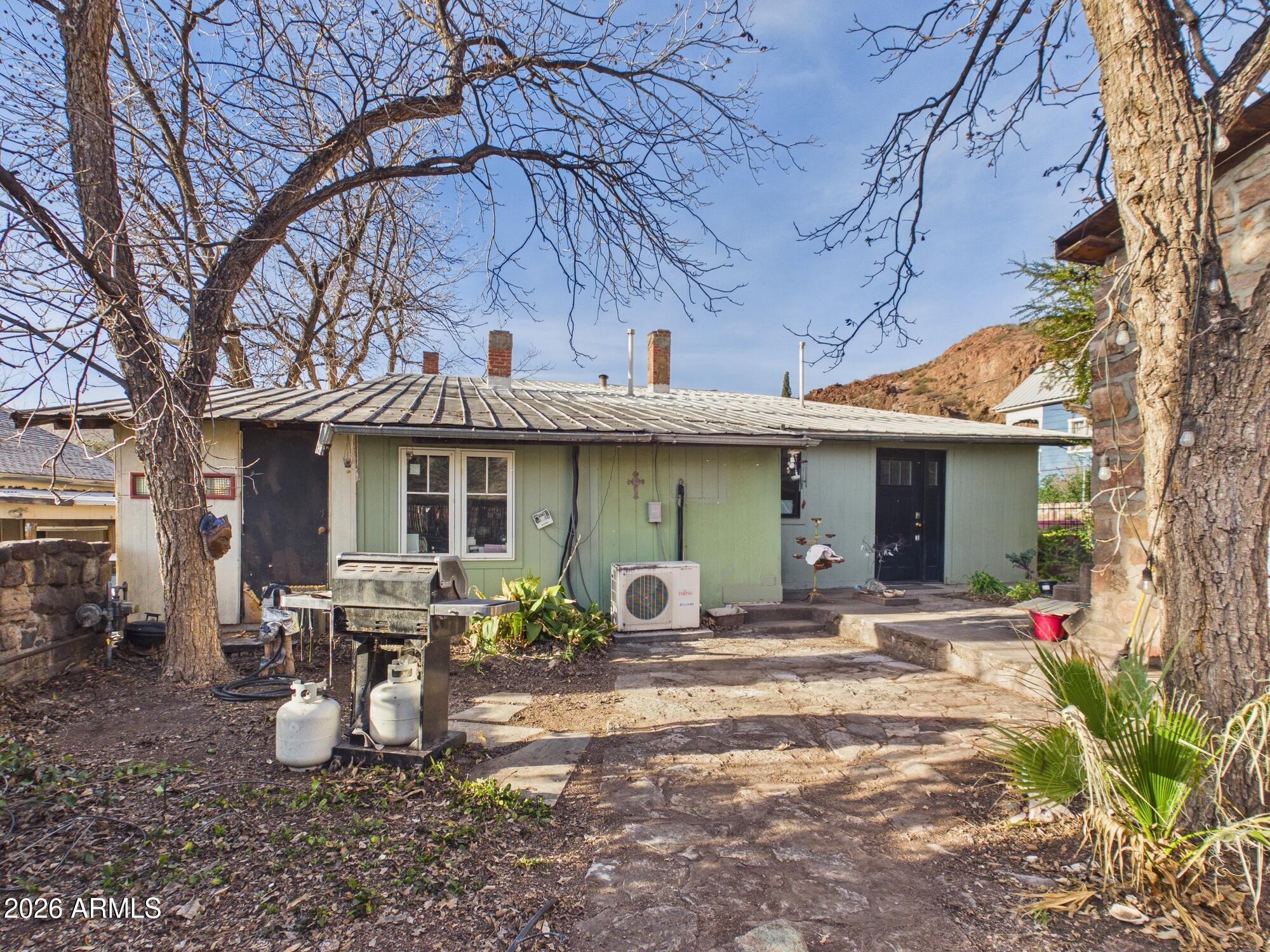 198 4th Street Clifton, AZ 85533 - Photo 28 of 30 a front view of a house with patio