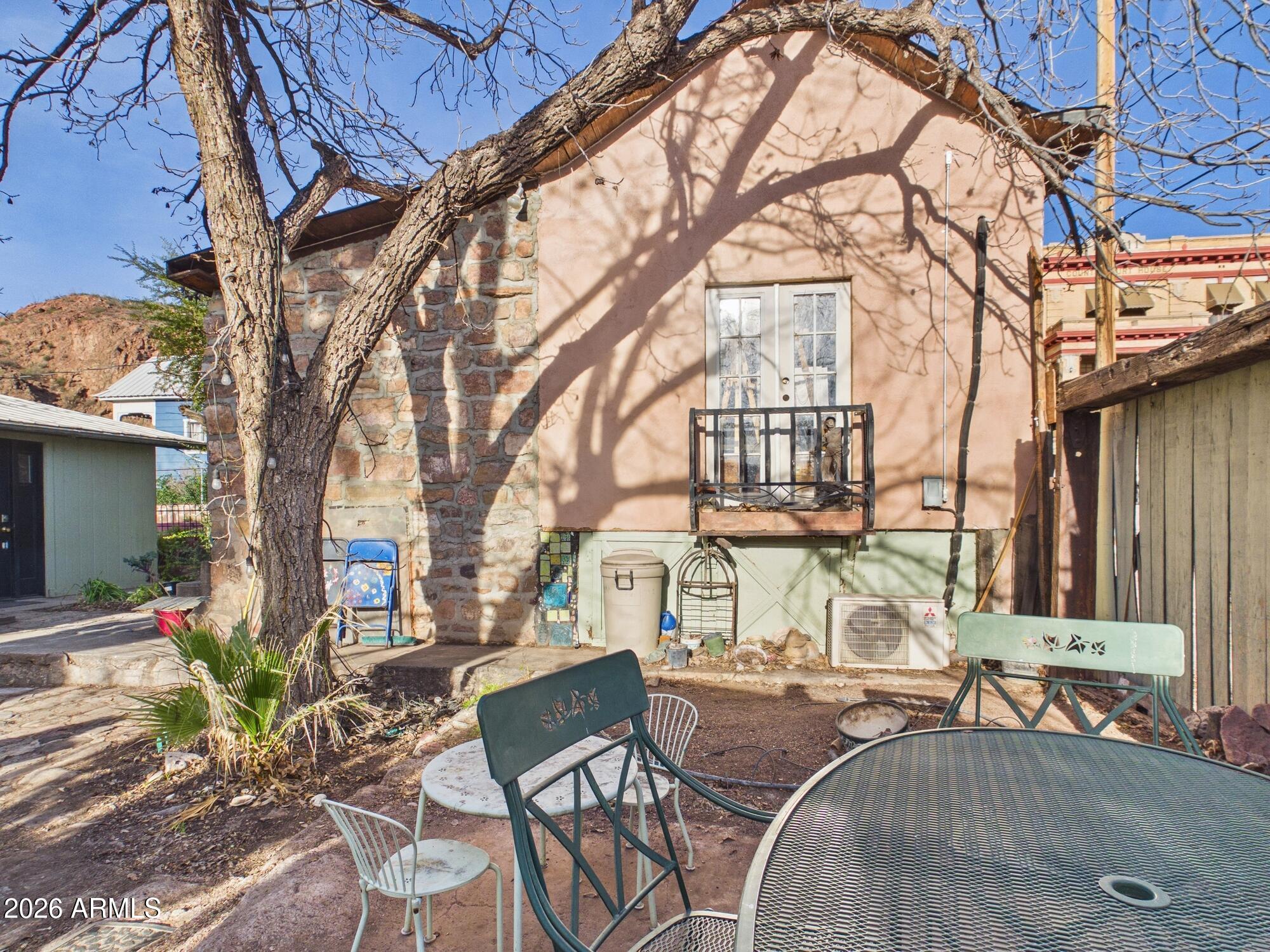 198 4th Street Clifton, AZ 85533 - Photo 29 of 30 a view of a chairs and tables in the patio