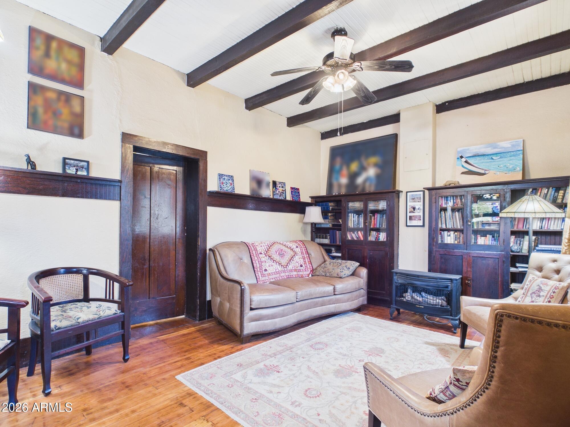 198 4th Street Clifton, AZ 85533 - Photo 4 of 30 a living room with furniture and wooden floor