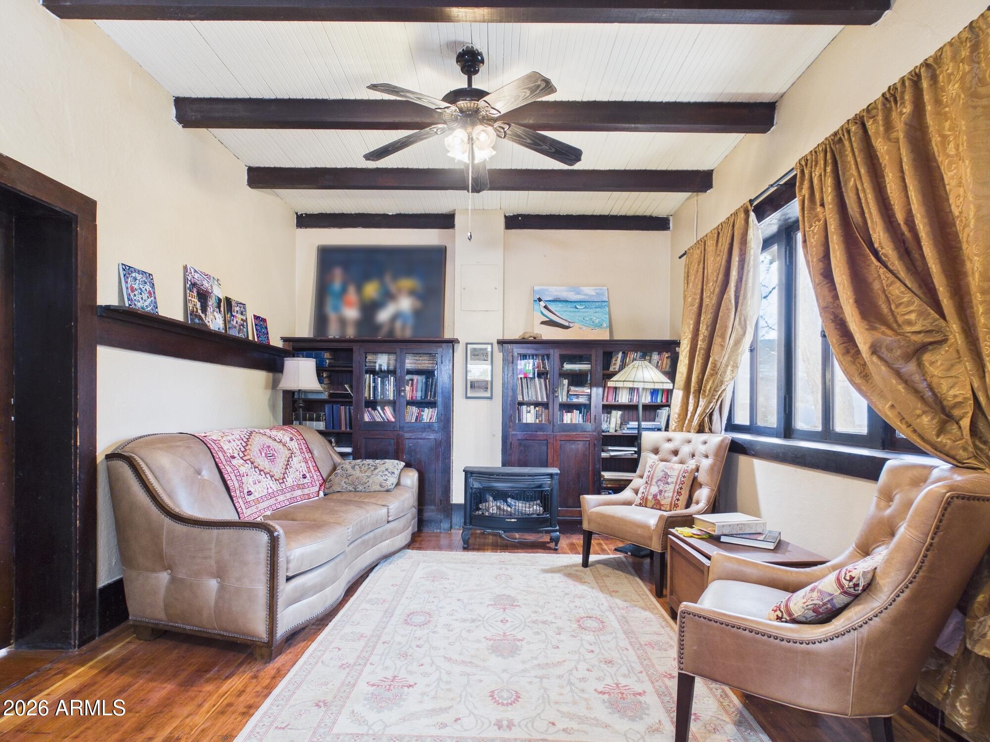 198 4th Street Clifton, AZ 85533 - Photo 7 of 30 a living room with furniture and a rug