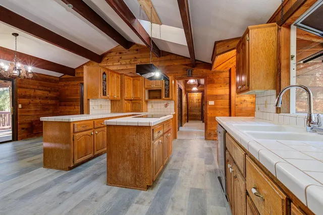 a bathroom with a sink and a large mirror