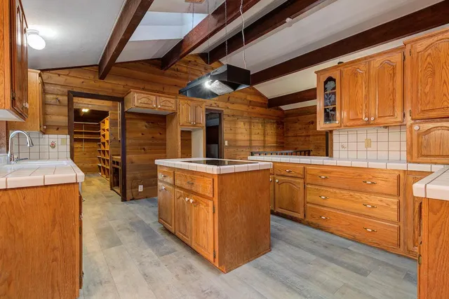 a bathroom with a sink double vanity and a tub